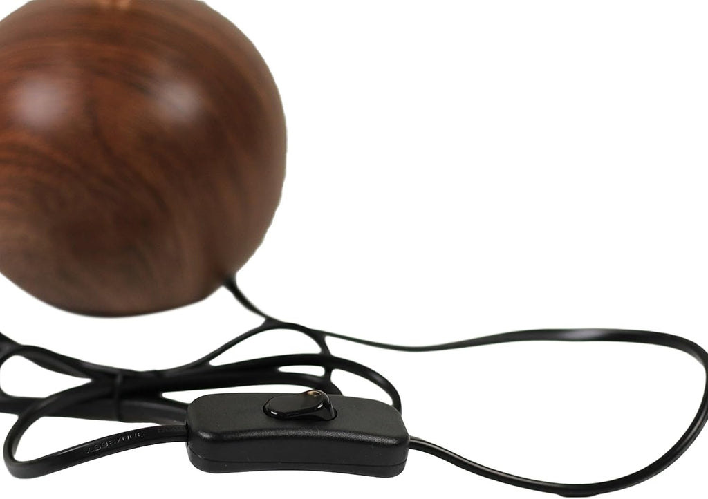 Ceramic globe table lamp in living room